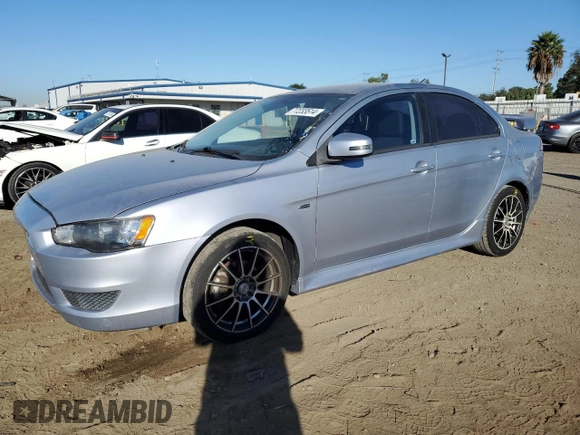 2015 Mitsubishi Lancer ES with VIN JA32U2FU4FU021260, listed as a Copart auction lot 77233514 with 99,548 mi miles and Salvage Title. Bid and sale history available at carsss.com. Image 1.