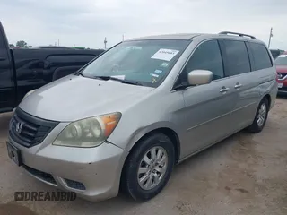 2008 Honda Odyssey EX-L with VIN 5FNRL38648B094938, listed as a IAAI auction lot 42045683 with 216,405 mi miles. Bid and sale history available at carsss.com. Image 2.