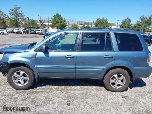 2006 Honda Pilot EX-L with RES with VIN 2HKYF18626H505792, listed as a IAAI auction lot 41861686 with 180,551 mi miles. Bid and sale history available at carsss.com. Image 14.