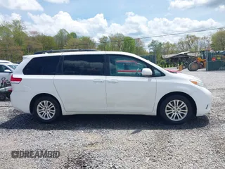 2011 Toyota Sienna XLE AAS z VIN 5TDYK3DC6BS172939, wystawiony jako IAAI lot #42111002 z przebiegiem 172 160 mil mil oraz . Historia ofert i sprzedaży dostępna na DreamBid. Obrazek 14.