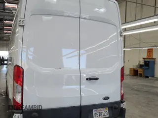 2020 Ford Transit Cargo z VIN 1FTBR1XG3LKB79165, wystawiony jako IAAI lot #42763042 z przebiegiem 140 992 mil mil oraz . Historia ofert i sprzedaży dostępna na DreamBid. Obrazek 34.