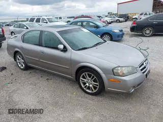 2002 Nissan Maxima GLE z VIN JN1DA31A12T000651, wystawiony jako IAAI lot #42167202 z przebiegiem Nie podano mil oraz . Historia ofert i sprzedaży dostępna na DreamBid. Obrazek 1.