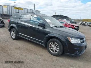 2013 Dodge Journey SXT with VIN 3C4PDDBG7DT553130, listed as a IAAI auction lot 40570369 with Not Provided miles and . Bid and sale history available at DreamBid. Image 1.