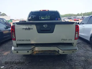 2015 Nissan Frontier S with VIN 1N6AD0EV0FN717018, listed as a IAAI auction lot 42322428 with 104,715 mi miles and . Bid and sale history available at DreamBid. Image 16.