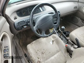 1993 Mazda 626 z VIN 1YVGE22B9P5208685, wystawiony jako Copart lot #73931064 z przebiegiem 91 446 mil mil oraz Nie do naprawy. Historia ofert i sprzedaży dostępna na DreamBid. Obrazek 8.