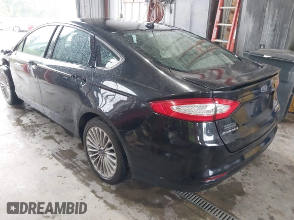 2013 Ford Fusion Titanium Hybrid with VIN 3FA6P0RU4DR281789, listed as a IAAI auction lot 41909115 with 161,008 mi miles and . Bid and sale history available at DreamBid. Image 3.