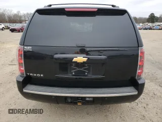 2014 Chevrolet Tahoe LTZ z VIN 1GNSCCE04ER156563, wystawiony jako Copart lot #44647735 z przebiegiem 135 849 mil mil oraz Czysty tytuł • Clean title. Historia ofert i sprzedaży dostępna na DreamBid. Obrazek 6.