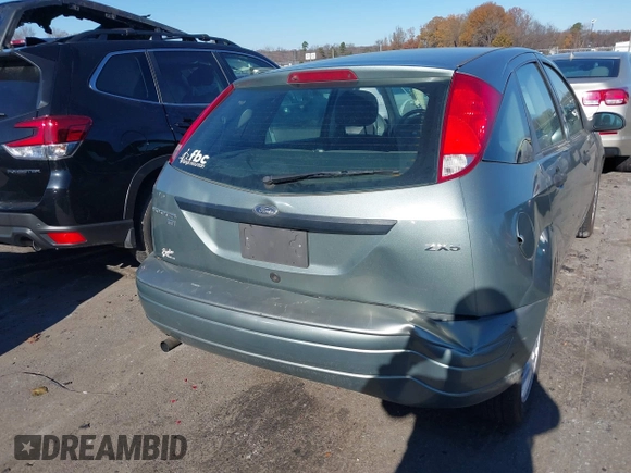 2006 Ford Focus S z VIN 1FAFP37N16W164037, wystawiony jako IAAI lot #41035779 z przebiegiem 251 770 mil mil oraz . Historia ofert i sprzedaży dostępna na DreamBid. Obrazek 6.