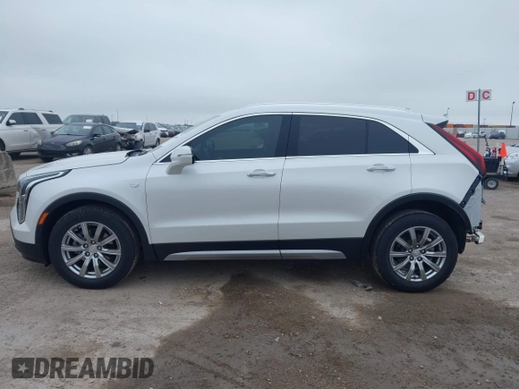 2023 Cadillac XT4 FWD Premium Luxury with VIN 1GYFZCR49PF225817, listed as a IAAI auction lot 42408494 with 5,977 mi miles and . Bid and sale history available at DreamBid. Image 14.