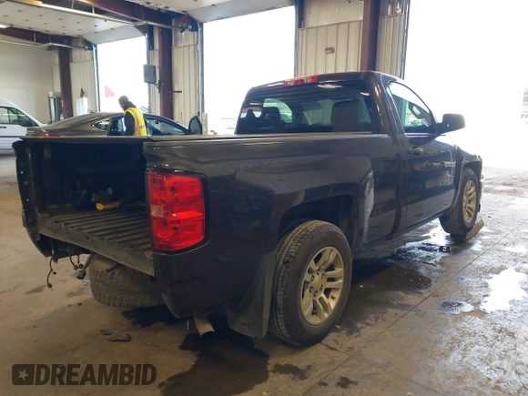 2014 Chevrolet Silverado 1500 with VIN 1GCNCREH0EZ393422, listed as a IAAI auction lot 41730168 with 113,861 mi miles and . Bid and sale history available at DreamBid. Image 4.