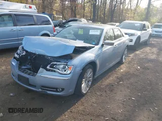 2012 Chrysler 300 Limited with VIN 2C3CCACG9CH166184, listed as a IAAI auction lot 42058060 with 97,897 mi miles and . Bid and sale history available at carsss.com. Image 2.