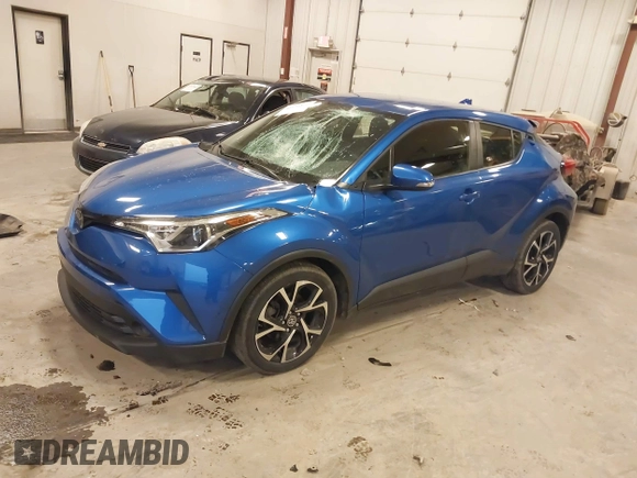 2019 Toyota C-HR XLE with VIN JTNKHMBX0K1042342, listed as a IAAI auction lot 41935879 with 54,190 mi miles and . Bid and sale history available at DreamBid. Image 17.