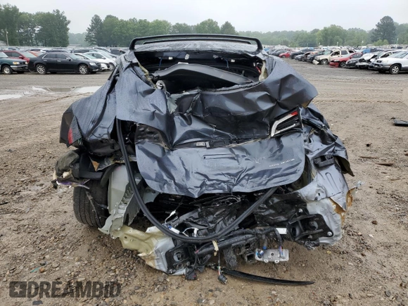 2023 Tesla Model Y Long Range z VIN 7SAYGDEE7PF870370, wystawiony jako Copart lot #55700135 z przebiegiem 32 410 mil mil oraz Szkoda całkowita • Salvage title. Historia ofert i sprzedaży dostępna na DreamBid. Obrazek 6.