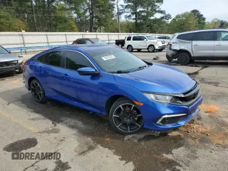 2019 Honda Civic LX with VIN 19XFC2F63KE016017, listed as a Copart auction lot 50440945 with 122,073 mi miles and Salvage Title. Bid and sale history available at DreamBid. Image 4.