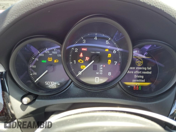 2023 Porsche Macan with VIN WP1AA2A54PLB07597, listed as a Copart auction lot 64077345 with 50,704 mi miles and Salvage title. Bid and sale history available at DreamBid. Image 9.