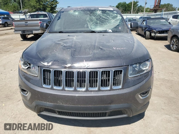 2016 Jeep Grand Cherokee Laredo with VIN 1C4RJFAG2GC328841, listed as a Copart auction lot 63553435 with 100,472 mi miles and Salvage title. Bid and sale history available at DreamBid. Image 5.