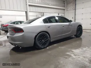 2016 Dodge Charger SXT with VIN 2C3CDXJG9GH180966, listed as a IAAI auction lot 41243491 with 127,235 mi miles. Bid and sale history available at carsss.com. Image 4.