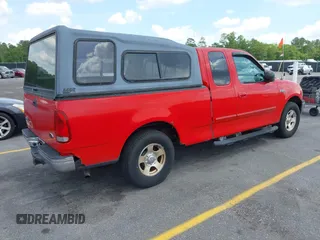 2003 Ford F-150 XL with VIN 1FTRX17243NA84413, listed as a IAAI auction lot 42132813 with 190,715 mi miles. Bid and sale history available at carsss.com. Image 4.