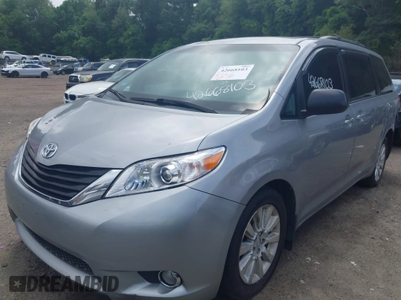 2013 Toyota Sienna LE with VIN 5TDJK3DC9DS054310, listed as a IAAI auction lot 42668103 with 209,712 mi miles and . Bid and sale history available at DreamBid. Image 2.