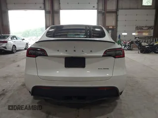 2020 Tesla Model Y Long Range z VIN 5YJYGDEE5LF041935, wystawiony jako IAAI lot #42369750 z przebiegiem 79 540 mil mil oraz . Historia ofert i sprzedaży dostępna na DreamBid. Obrazek 17.