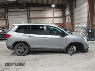 2021 Honda Passport EX-L with VIN 5FNYF8H56MB000107, listed as a IAAI auction lot 41868429 with 66,572 mi miles and . Bid and sale history available at DreamBid. Image 14.