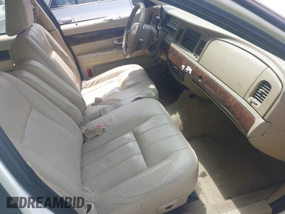 2008 Mercury Grand Marquis LS with VIN 2MEFM75VX8X600015, listed as a IAAI auction lot 42142359 with 310,481 mi miles and . Bid and sale history available at DreamBid. Image 5.