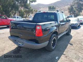 2001 Ford Explorer Sport Trac z VIN 1FMZU77E91UB34713, wystawiony jako IAAI lot #42754266 z przebiegiem 234 203 mil mil oraz . Historia ofert i sprzedaży dostępna na DreamBid. Obrazek 4.