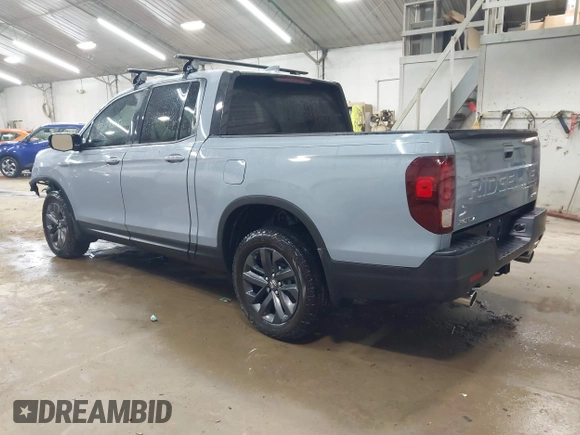 2024 Honda Ridgeline Sport z VIN 5FPYK3F16RB015283, wystawiony jako IAAI lot #42177340 z przebiegiem 7 581 mil mil oraz . Historia ofert i sprzedaży dostępna na DreamBid. Obrazek 3.