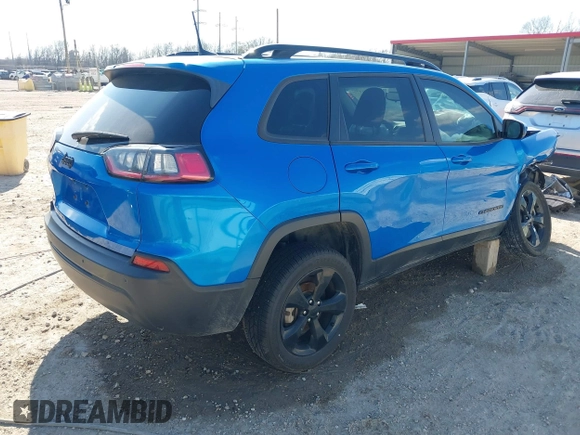 2021 Jeep Cherokee Altitude with VIN 1C4PJLLB6MD134228, listed as a IAAI auction lot 41501177 with 63,357 mi miles. Bid and sale history available at carsss.com. Image 4.