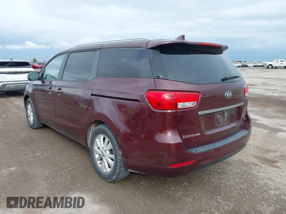 2016 Kia Sedona LX with VIN KNDMB5C10G6090643, listed as a IAAI auction lot 41911980 with 155,319 mi miles. Bid and sale history available at carsss.com. Image 3.
