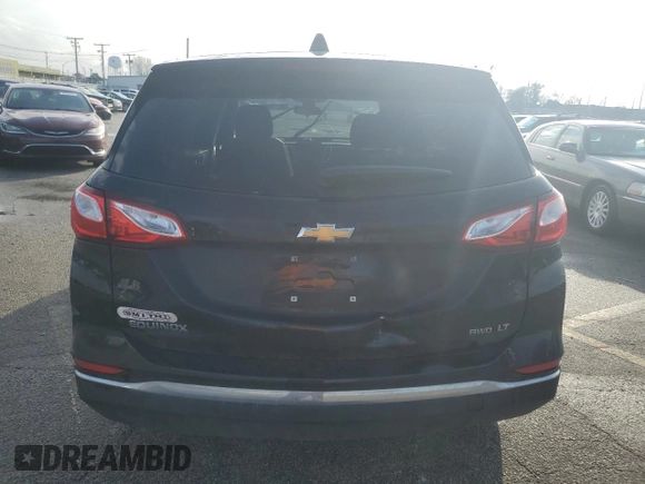 2021 Chevrolet Equinox LT with VIN 2GNAXUEV4M6104698, listed as a Copart auction lot 82340624 with 106,235 mi miles and Salvage Title. Bid and sale history available at DreamBid. Image 6.