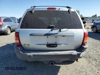 2004 Jeep Grand Cherokee Laredo with VIN 1J4GW48S54C103651, listed as a Copart auction lot 62972615 with 188,000 mi miles and Clean title. Bid and sale history available at DreamBid. Image 6.