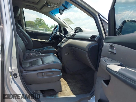 2011 Honda Odyssey Touring with VIN 5FNRL5H99BB058448, listed as a IAAI auction lot 42651432 with 208,581 mi miles and . Bid and sale history available at DreamBid. Image 5.