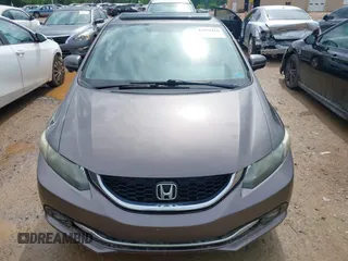 2015 Honda Civic EX-L z VIN 19XFB2F99FE029132, wystawiony jako IAAI lot #42351410 z przebiegiem 256 808 mil mil oraz . Historia ofert i sprzedaży dostępna na DreamBid. Obrazek 12.