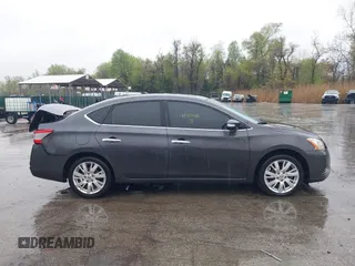 2013 Nissan Sentra S with VIN 3N1AB7AP5DL669623, listed as a IAAI auction lot 41987142 with 157,044 mi miles and . Bid and sale history available at DreamBid. Image 13.