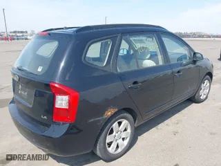 2007 Kia Rondo LX with VIN KNAFG525877029532, listed as a IAAI auction lot 42036604 with 225,698 mi miles. Bid and sale history available at carsss.com. Image 4.