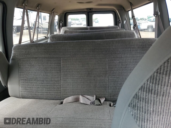 2000 Ford Econoline Passenger XL with VIN 1FBSS31L5YHA98957, listed as a Copart auction lot 56466624 with 102,350 mi miles and Salvage Title. Bid and sale history available at DreamBid. Image 10.
