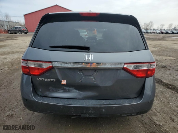 2012 Honda Odyssey EX-L with VIN 5FNRL5H61CB508181, listed as a Copart auction lot 52174205 with 203,763 mi miles and Salvage Title. Bid and sale history available at carsss.com. Image 6.