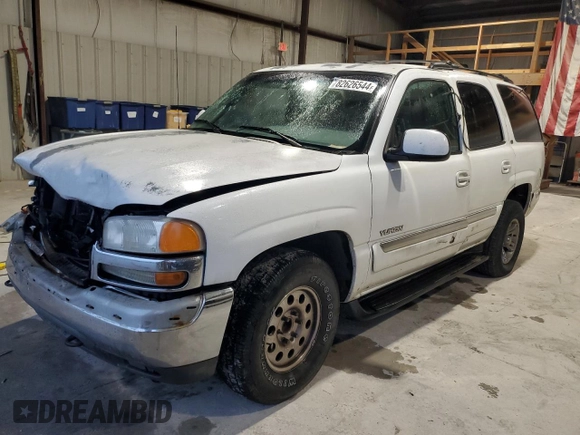 2000 GMC Yukon SLT with VIN 1GKEC13T9YJ159294, listed as a Copart auction lot 82626544 with 0 mi miles and Salvage Title. Bid and sale history available at carsss.com. Image 1.