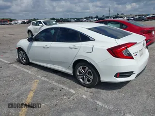 2016 Honda Civic Sedan LX with VIN 19XFC2F59GE068847, listed as a IAAI auction lot 42051510 with 113,450 mi miles. Bid and sale history available at carsss.com. Image 3.