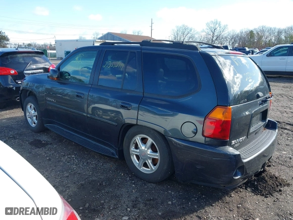 2005 GMC Envoy Denali with VIN 1GKET63M052336214, listed as a IAAI auction lot 41852417 with 999,999 mi miles. Bid and sale history available at carsss.com. Image 3.