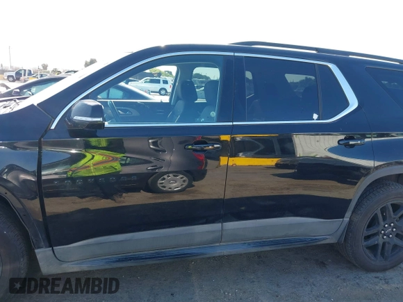2019 Chevrolet Traverse LT Cloth z VIN 1GNEVGKW7KJ208656, wystawiony jako IAAI lot #42373422 z przebiegiem 132 863 mil mil oraz . Historia ofert i sprzedaży dostępna na DreamBid. Obrazek 15.