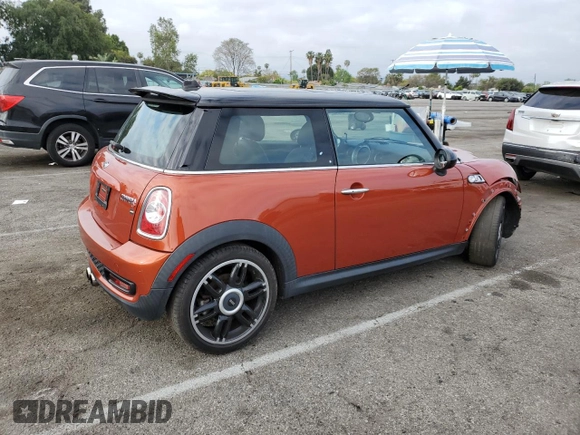 2013 MINI Hardtop S with VIN WMWSV3C57DT477948, listed as a Copart auction lot 54437155 with 63,114 mi miles and Salvage Title. Bid and sale history available at DreamBid. Image 3.