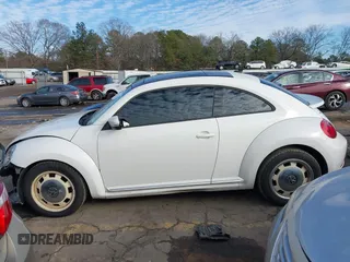 2014 Volkswagen Beetle 2.5L w/Sun with VIN 3VWJP7ATXEM628666, listed as a IAAI auction lot 41328014 with 70,990 mi miles and . Bid and sale history available at DreamBid. Image 15.