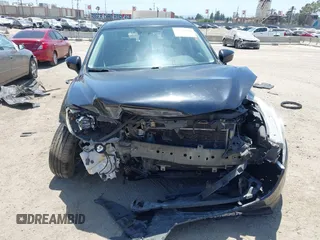 2016 Mazda CX-5 Grand Touring z VIN JM3KE2DY6G0900005, wystawiony jako IAAI lot #42311162 z przebiegiem 80 758 mil mil oraz . Historia ofert i sprzedaży dostępna na DreamBid. Obrazek 13.