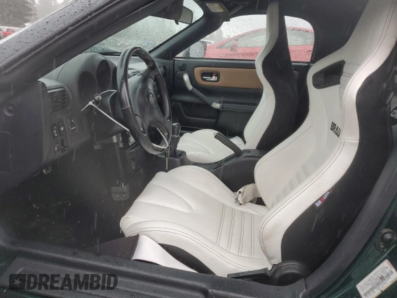2001 Toyota MR2 z VIN JTDFR320810037734, wystawiony jako Copart lot #51645125 z przebiegiem 269 261 mil mil oraz Szkody całkowita. Historia ofert i sprzedaży dostępna na DreamBid. Obrazek 7.