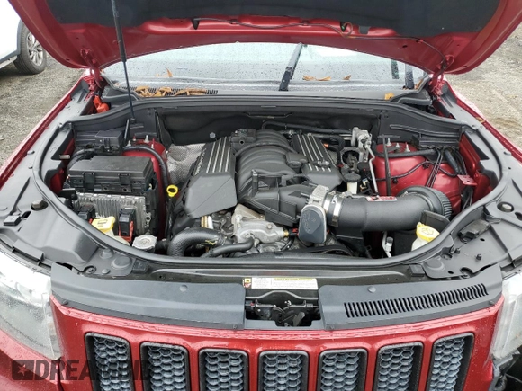2012 Jeep Grand Cherokee SRT8 with VIN 1C4RJFDJ0CC351195, listed as a Copart auction lot 72794454 with 104,672 mi miles and Salvage Title. Bid and sale history available at carsss.com. Image 12.
