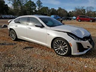 2021 Cadillac CT5 Premium Luxury with VIN 1G6DN5RK2M0125904, listed as a Copart auction lot 42701785 with 76,215 mi miles and Salvage title. Bid and sale history available at DreamBid. Image 4.