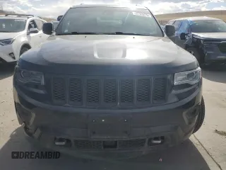 2014 Jeep Grand Cherokee Overland with VIN 1C4RJFCT2EC106002, listed as a Copart auction lot 48763675 with 143,011 mi miles and Salvage Title. Bid and sale history available at DreamBid. Image 5.