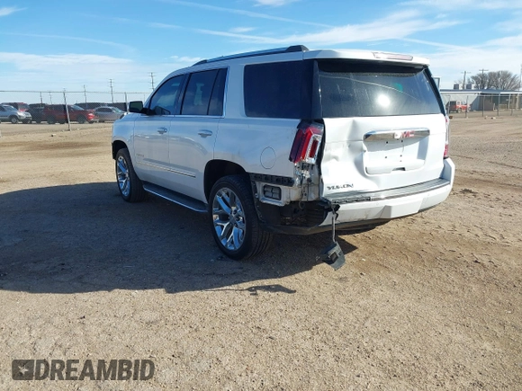 2020 GMC Yukon Denali with VIN 1GKS2CKJ3LR260455, listed as a IAAI auction lot 41690495 with 92,498 mi miles. Bid and sale history available at carsss.com. Image 3.